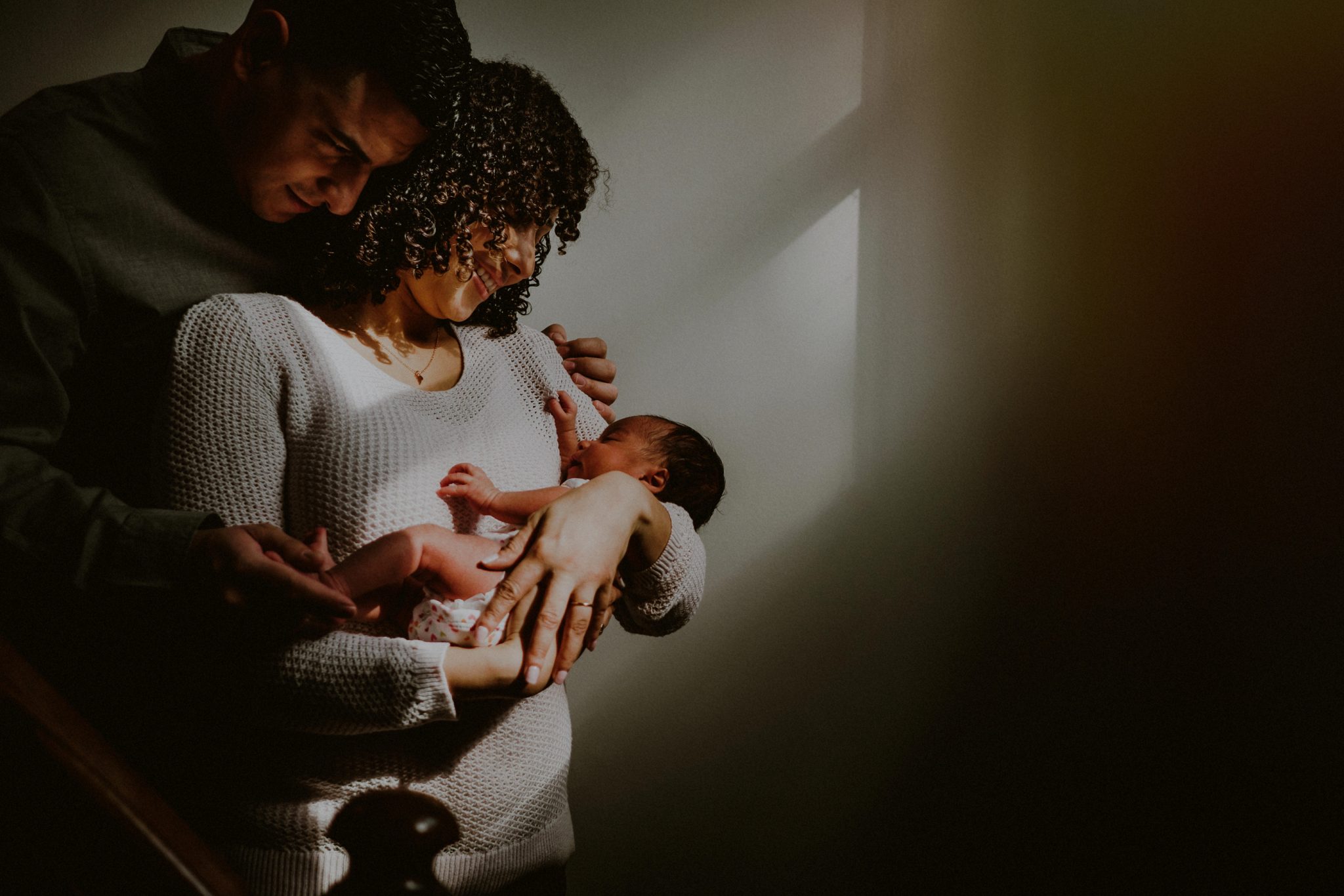emotional family portrait of parents holding newborn baby / gibbsboro nj newborn photos