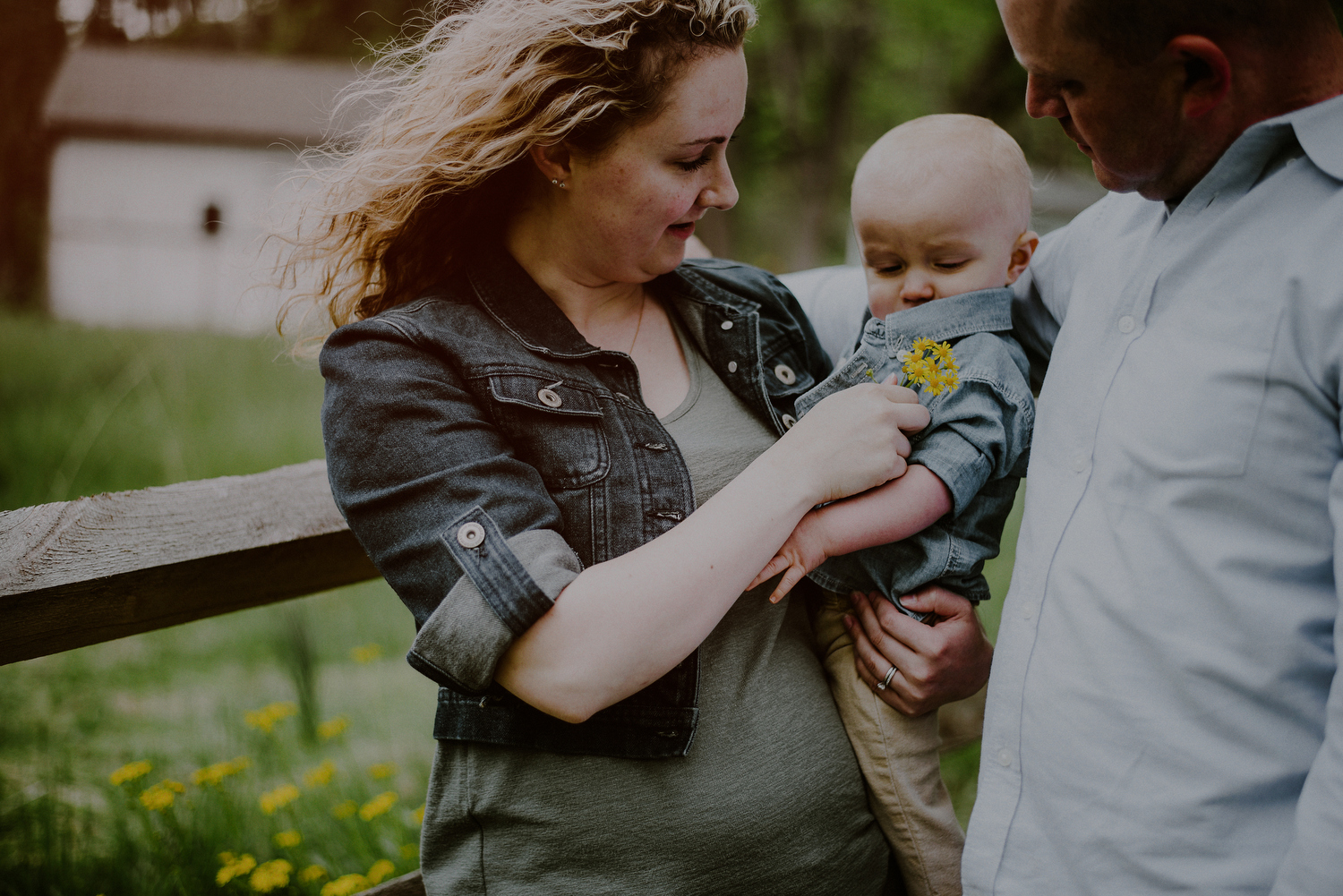 natural moment between parents and child during photo session