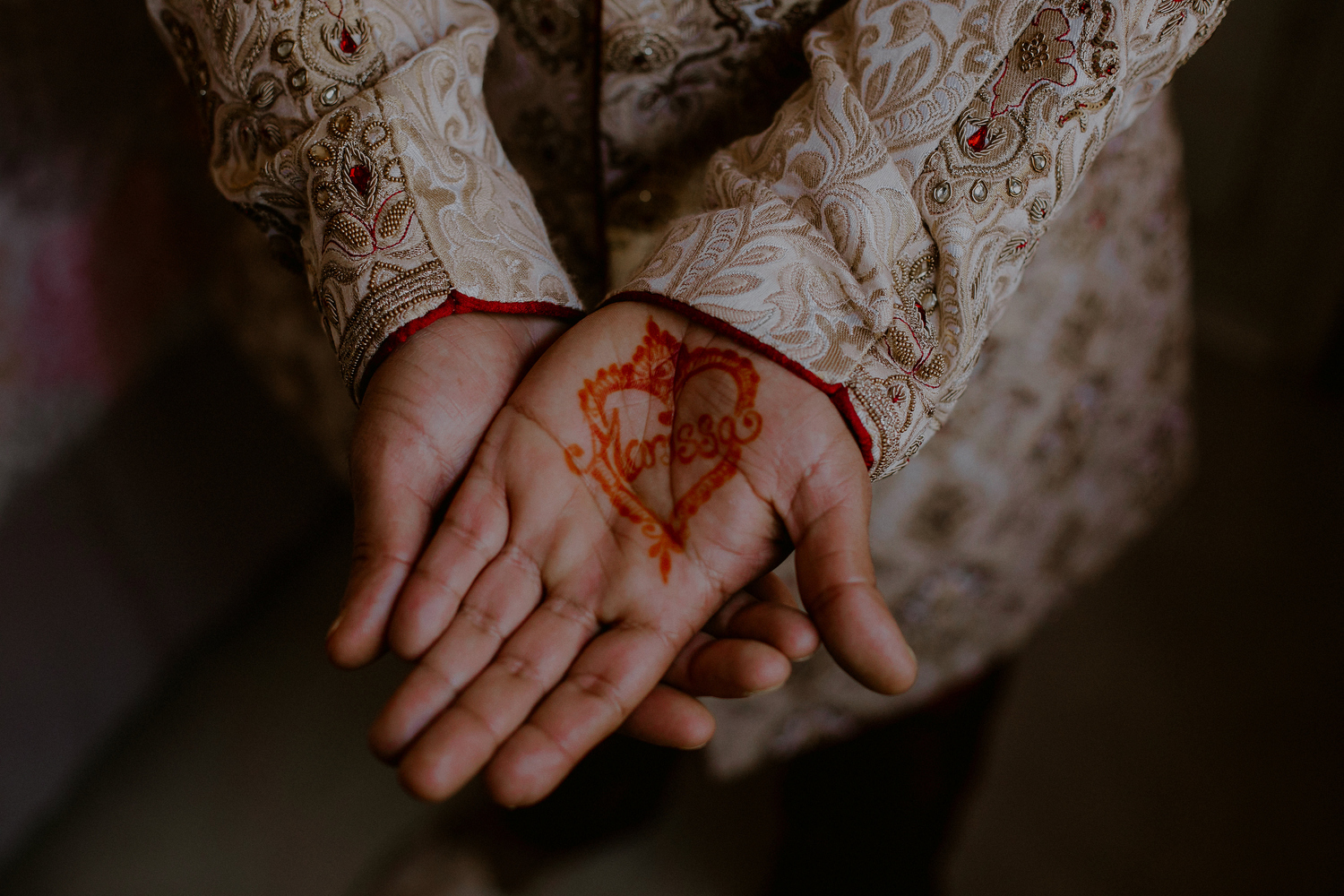 indian groom's henna on hands