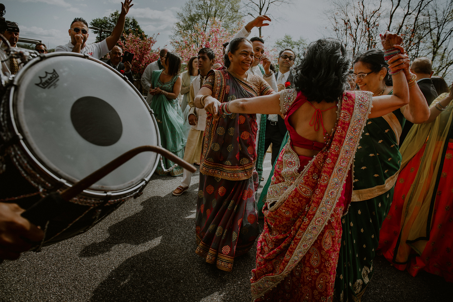 indian wedding photos of colorful baraat