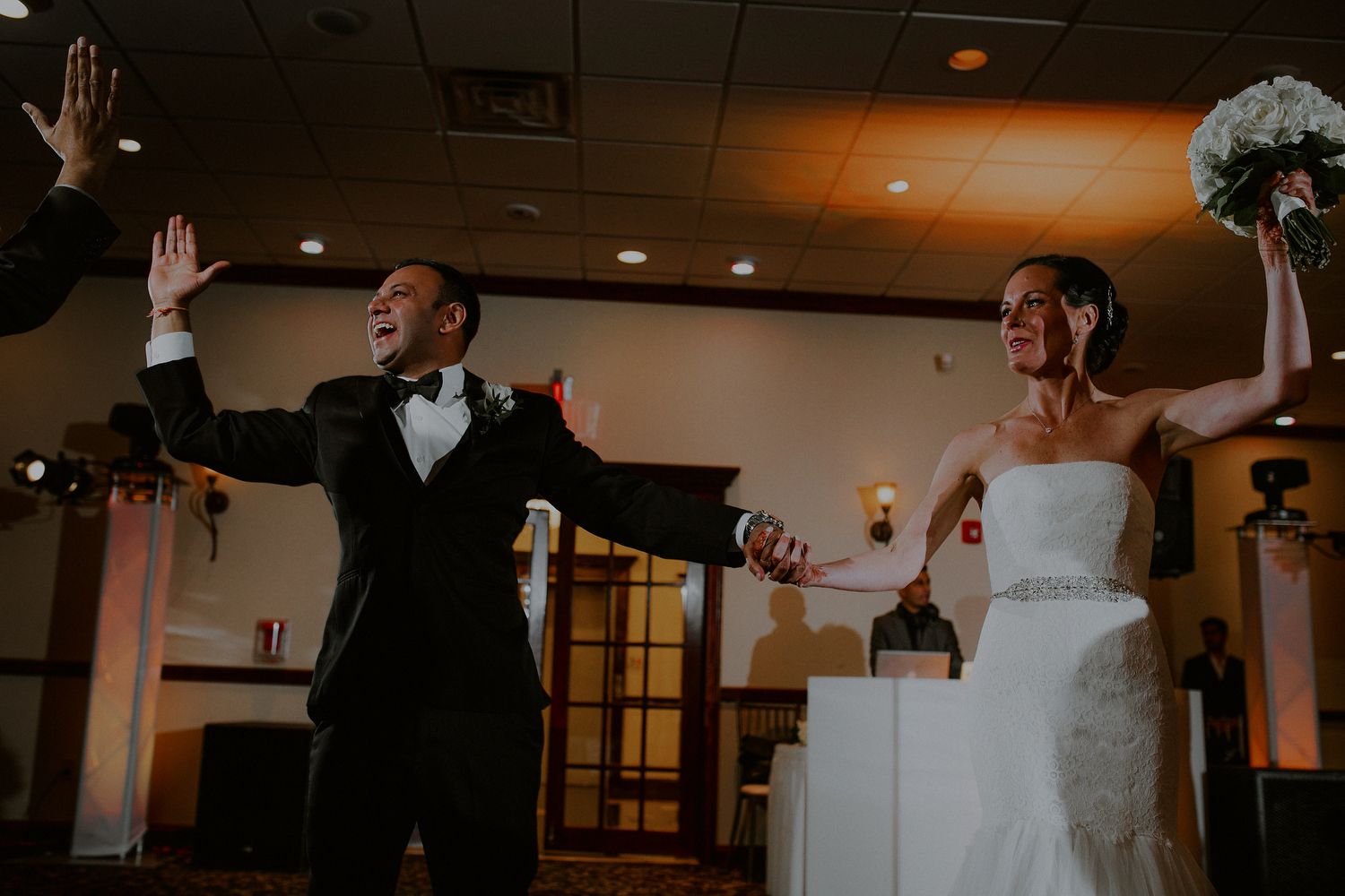 bride and groom entrance to wedding reception