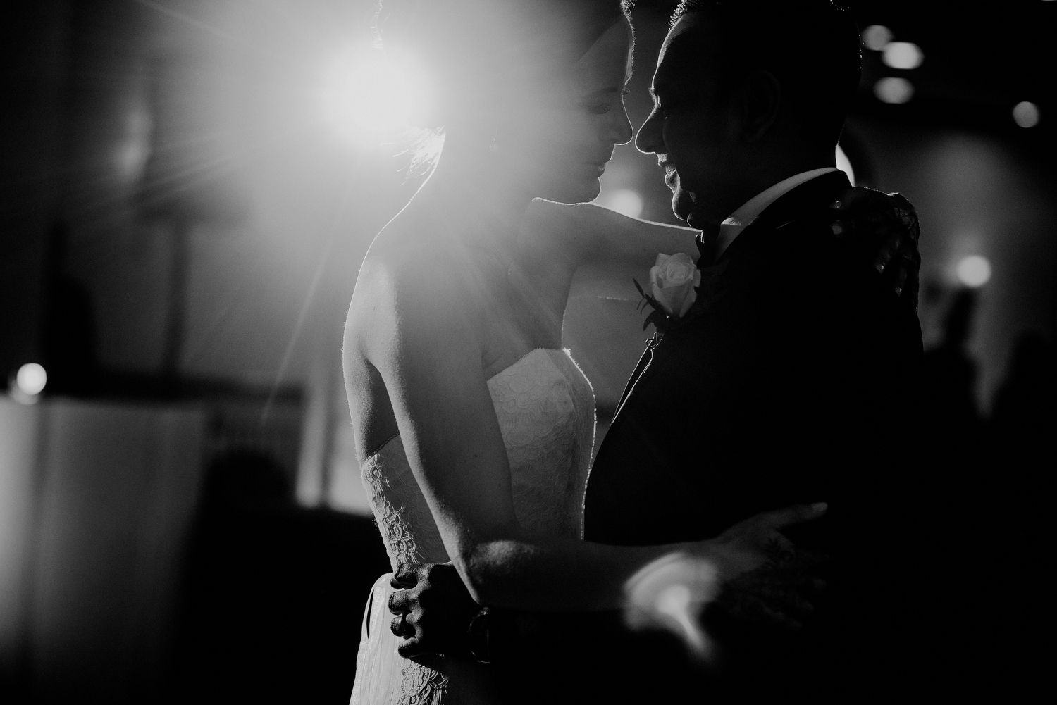 black and white picture of wedding couple first dance