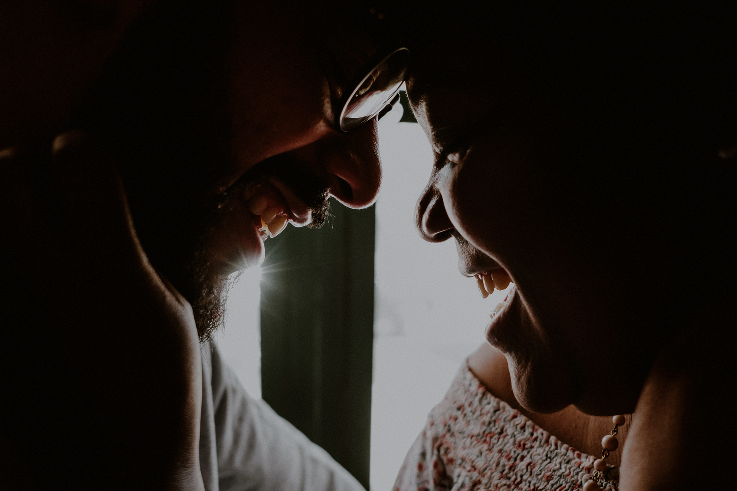 creative queens ny engagement photos of couple naturally smiling