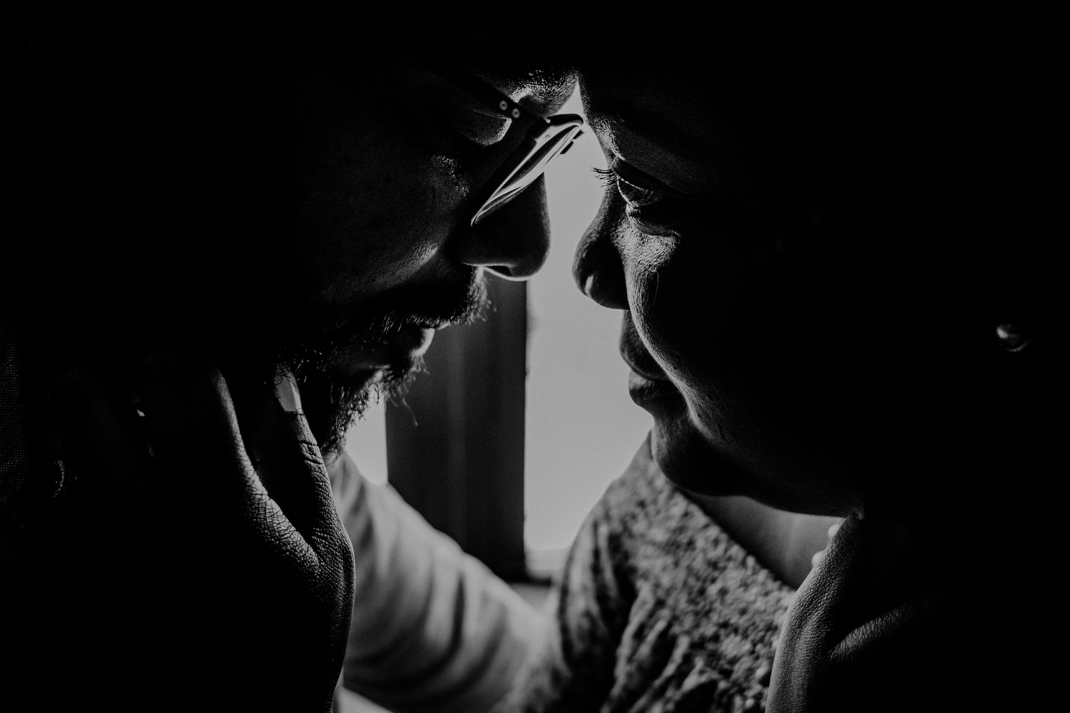 emotional queens ny engagement photos of couple in black and white