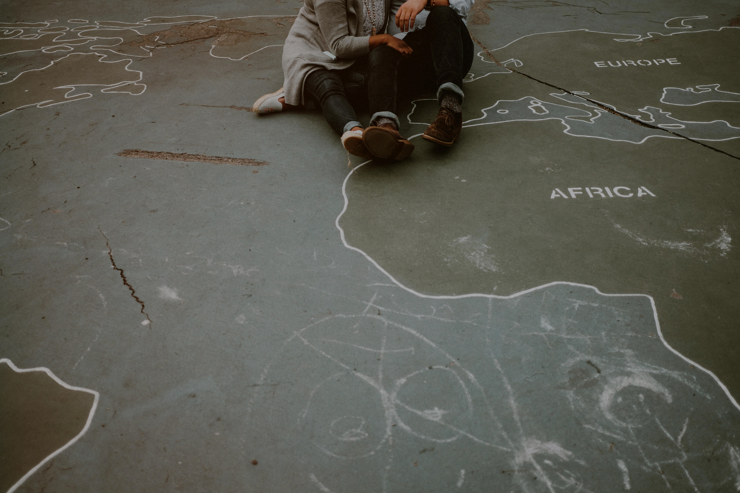 ny engagement photos of couple on playground