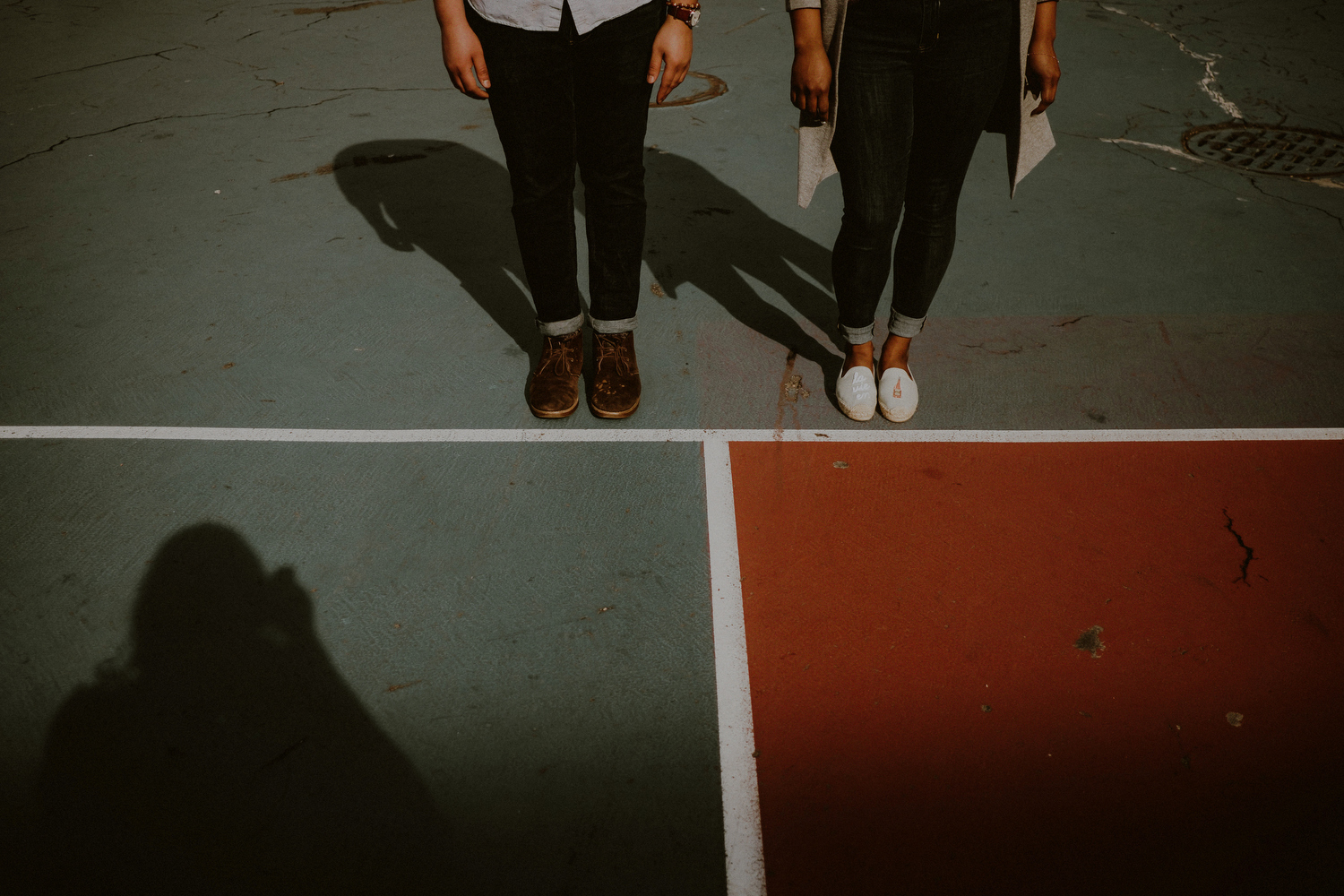 creative point of view engagement pics of couple on ny playground