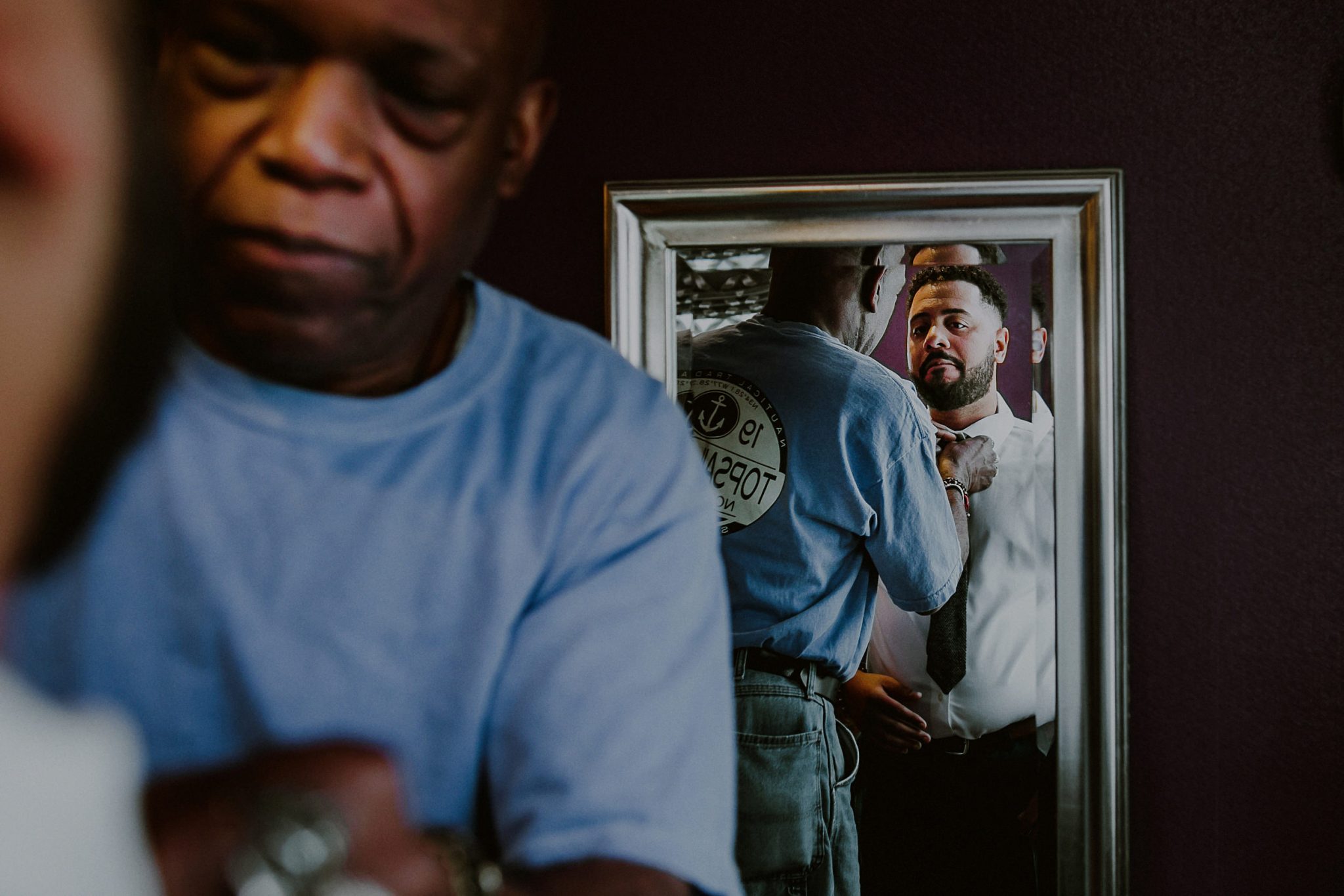 groom gets ready with dad