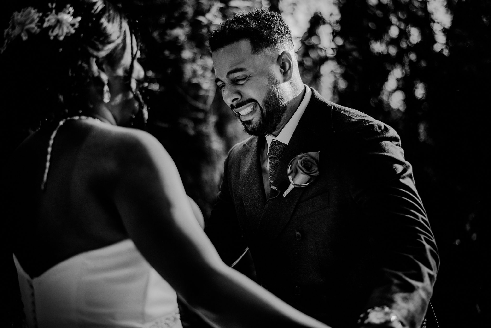 emotional groom during first look outside of fox hollow wedding venue