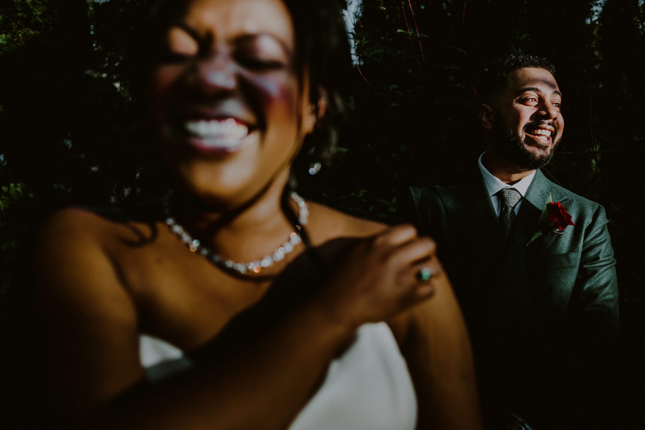 funny creative bride and groom portrait outside of spring wedding at fox hollow