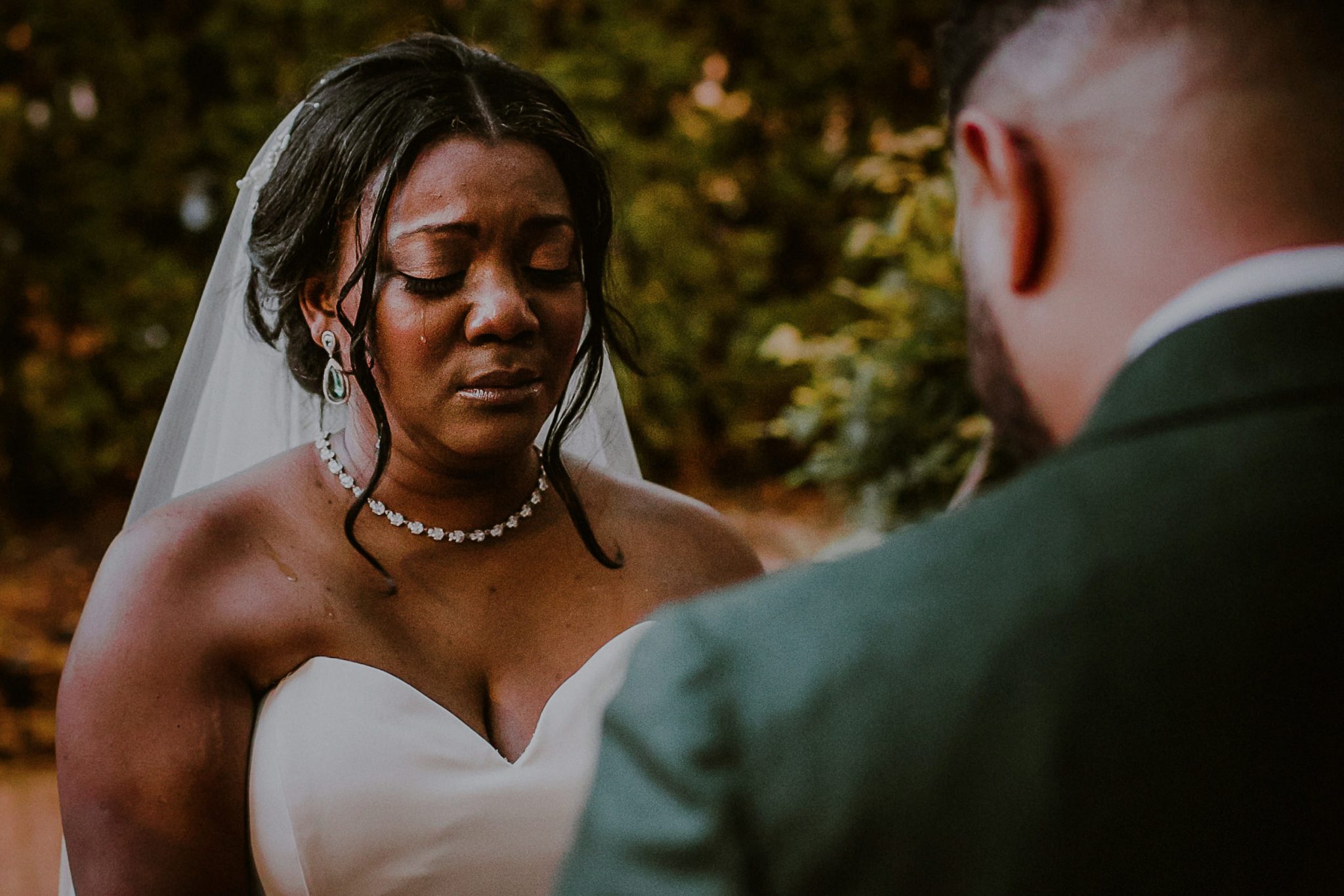 crying bride during wedding ceremony