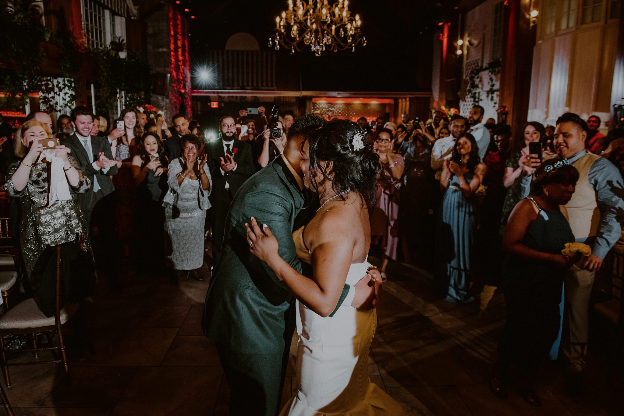 bride and groom surrounded by guests at their fox hollow wedding