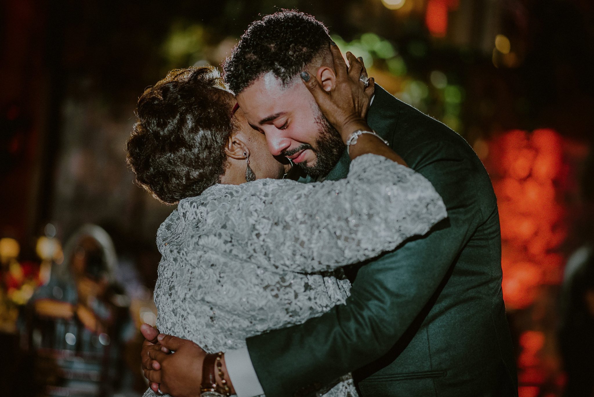 emotional son and mother dance