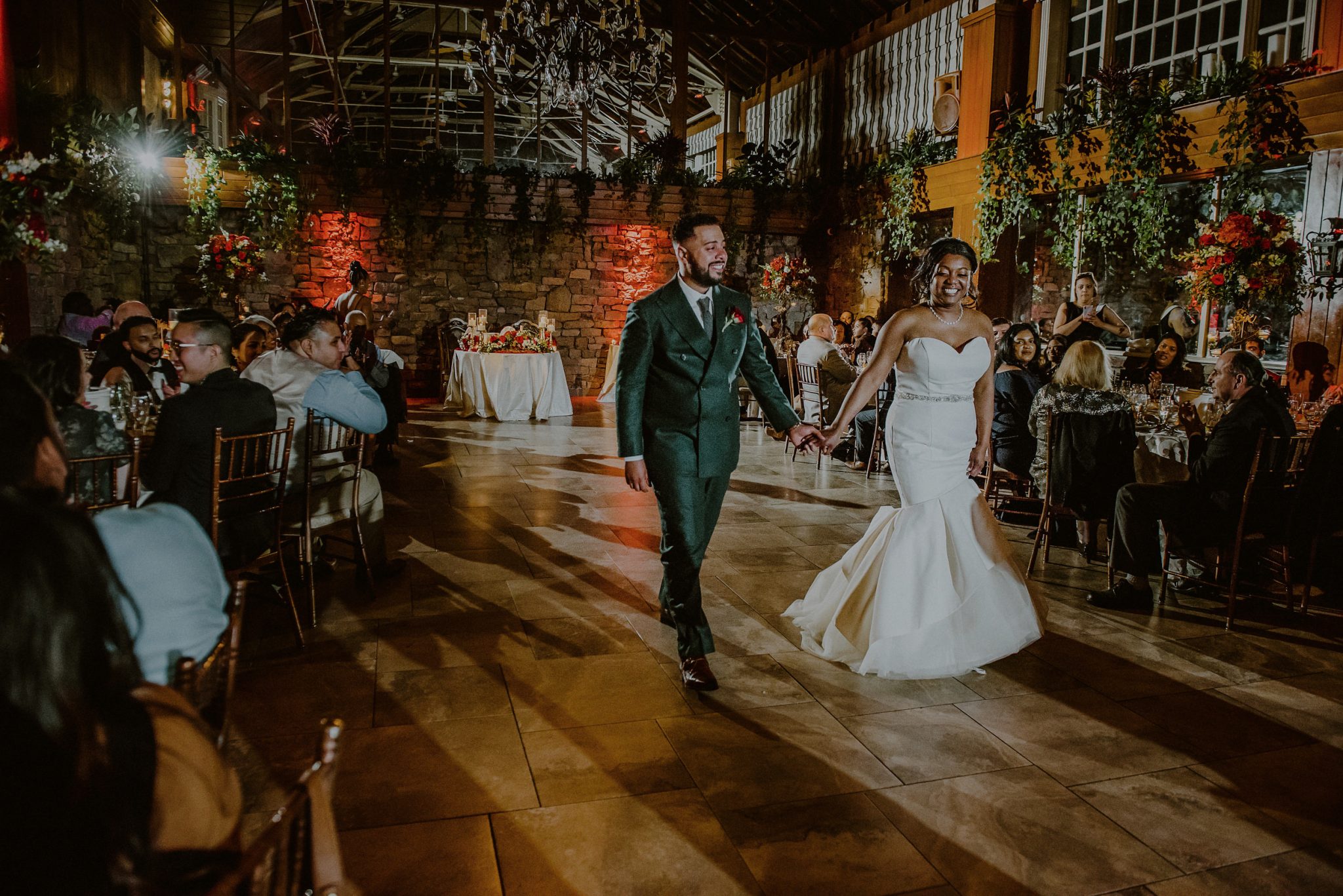 bride and groom at their fox hollow wedding surrounded by guests