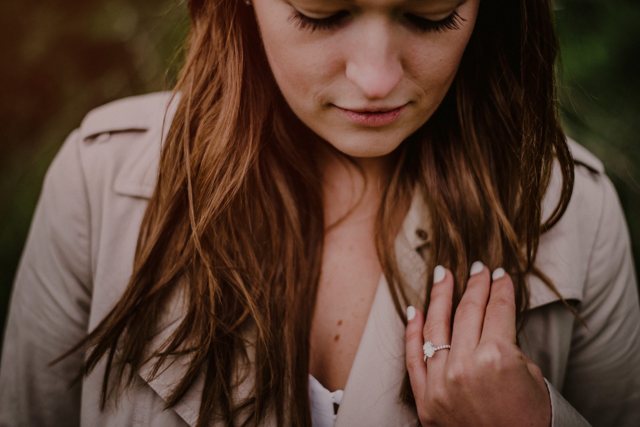 artistic portrait of newly engaged girl