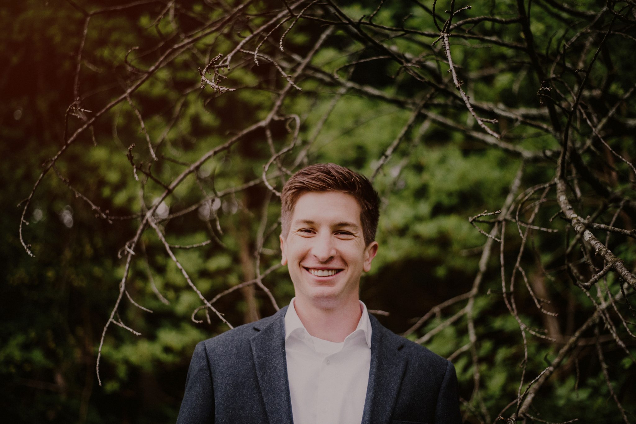 happy portrait of newly engaged groom after surprise proposal