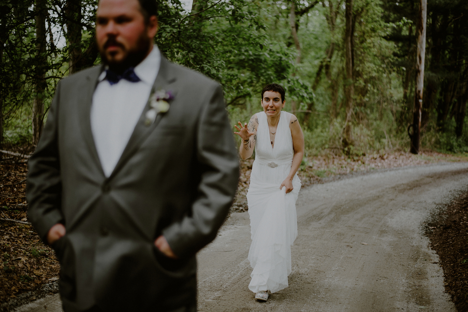 wedding first look between bride and groom in the woods