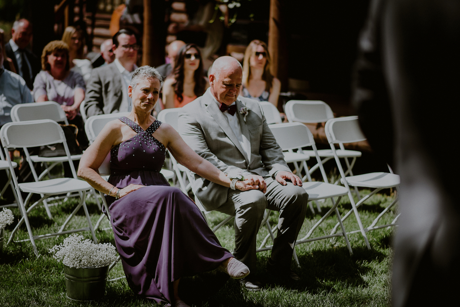 candid wedding photography moments during backyard wedding ceremony