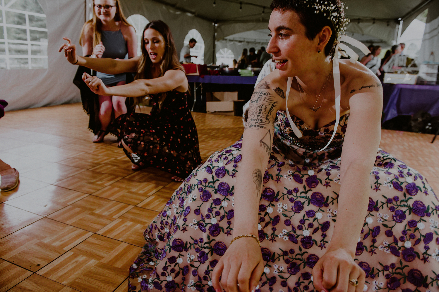 candid dance floor scenes from tented wedding