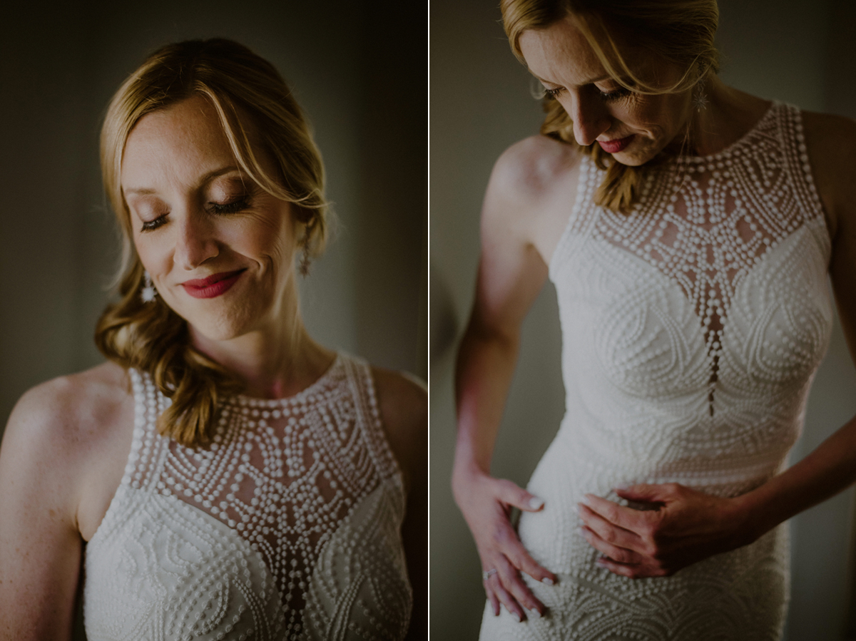 portrait of bride by window in fitted dress