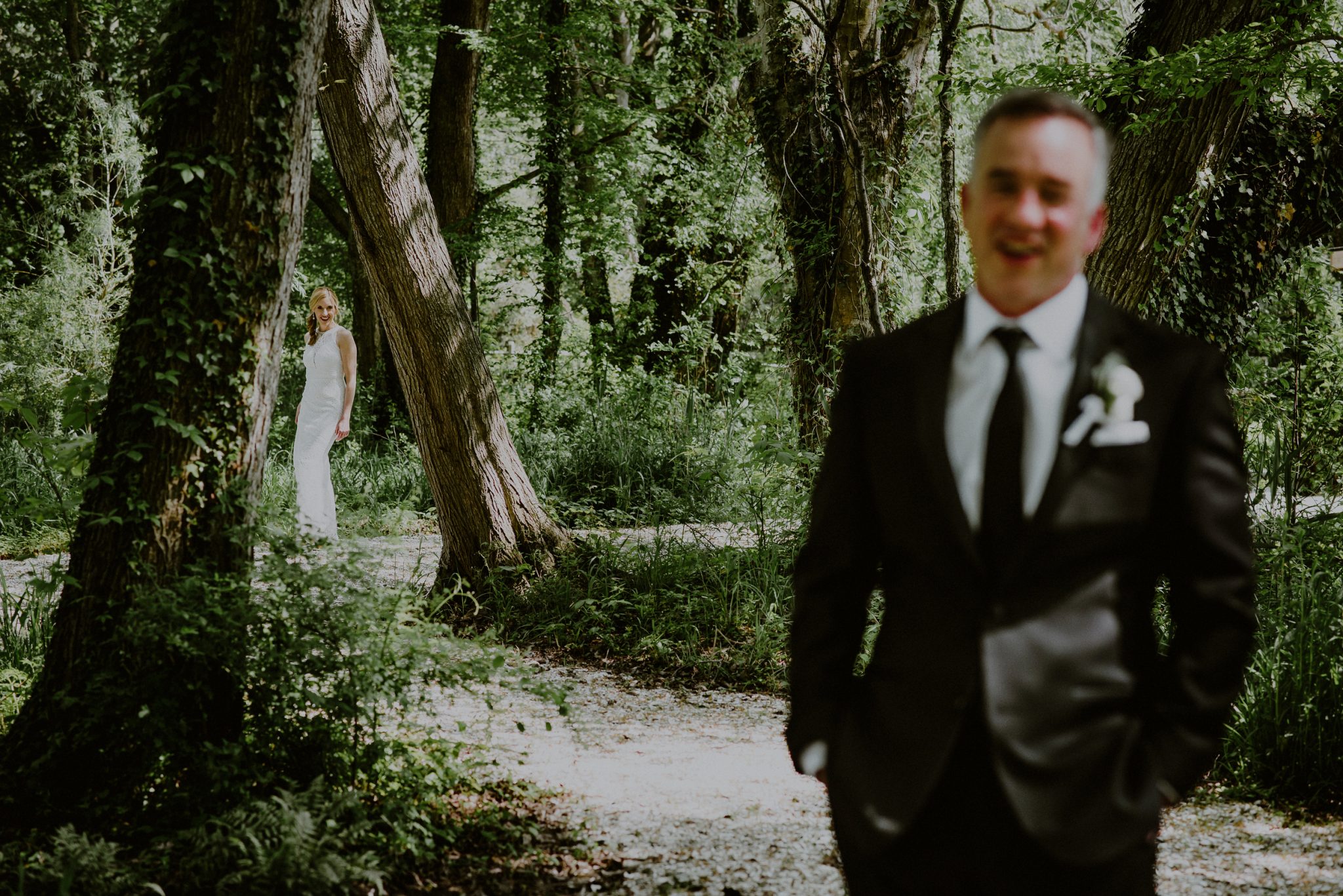 bride and groom first look in the woods of beach plum farm