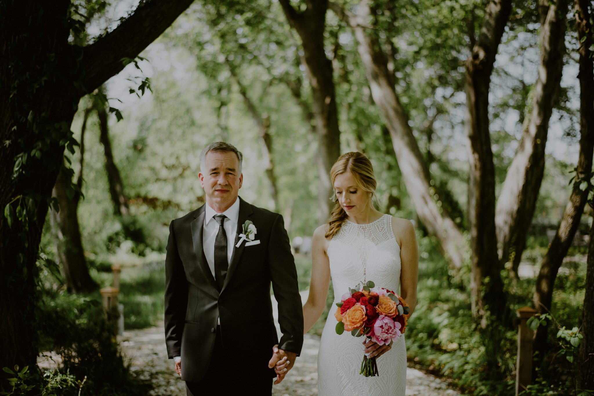 portrait of bride and groom in woods of beach plum farm