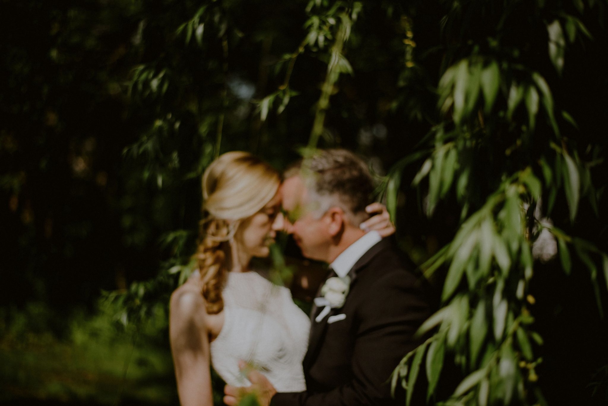 dramatic wedding photograph of bride and groom