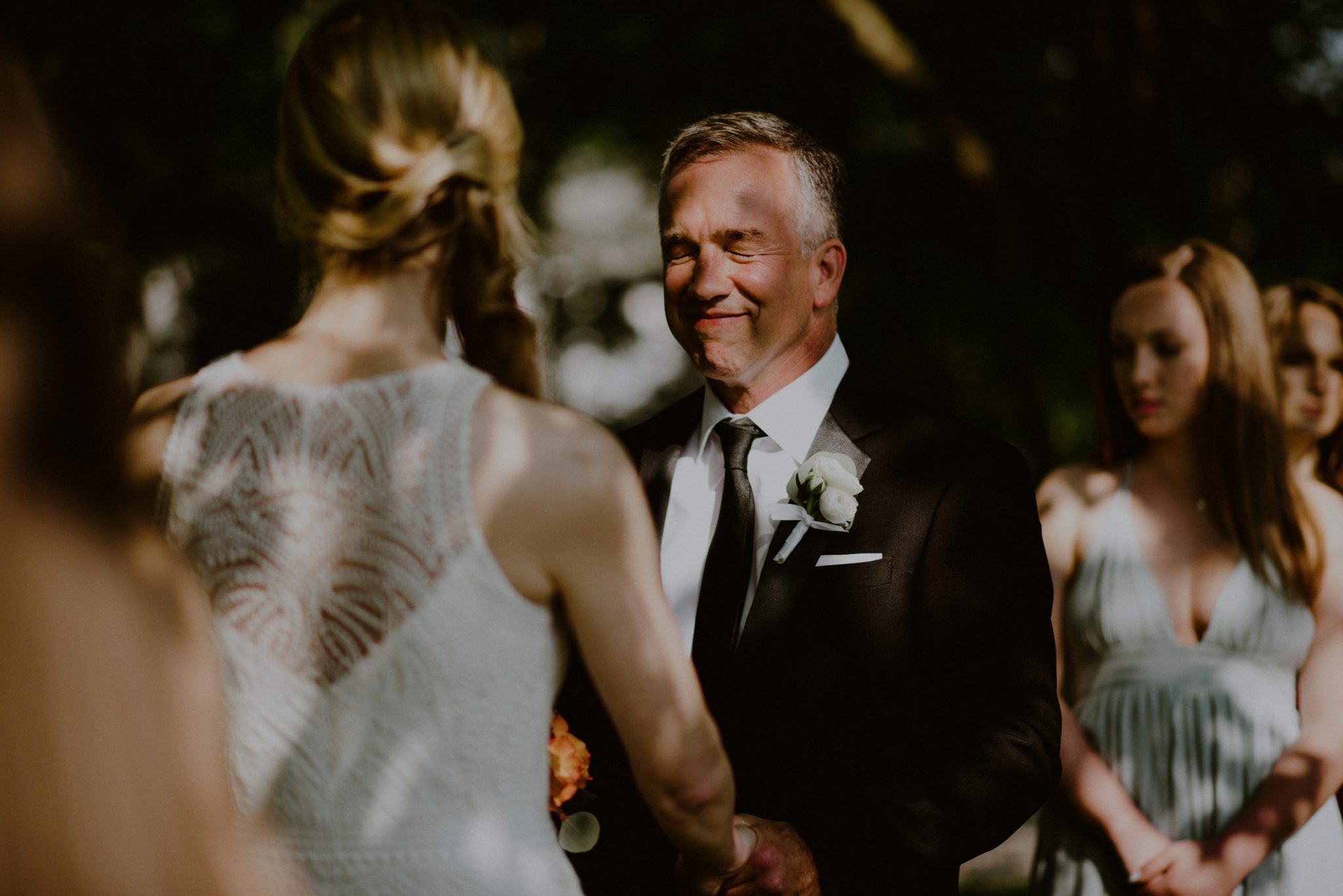 candid moment during wedding ceremony of groom