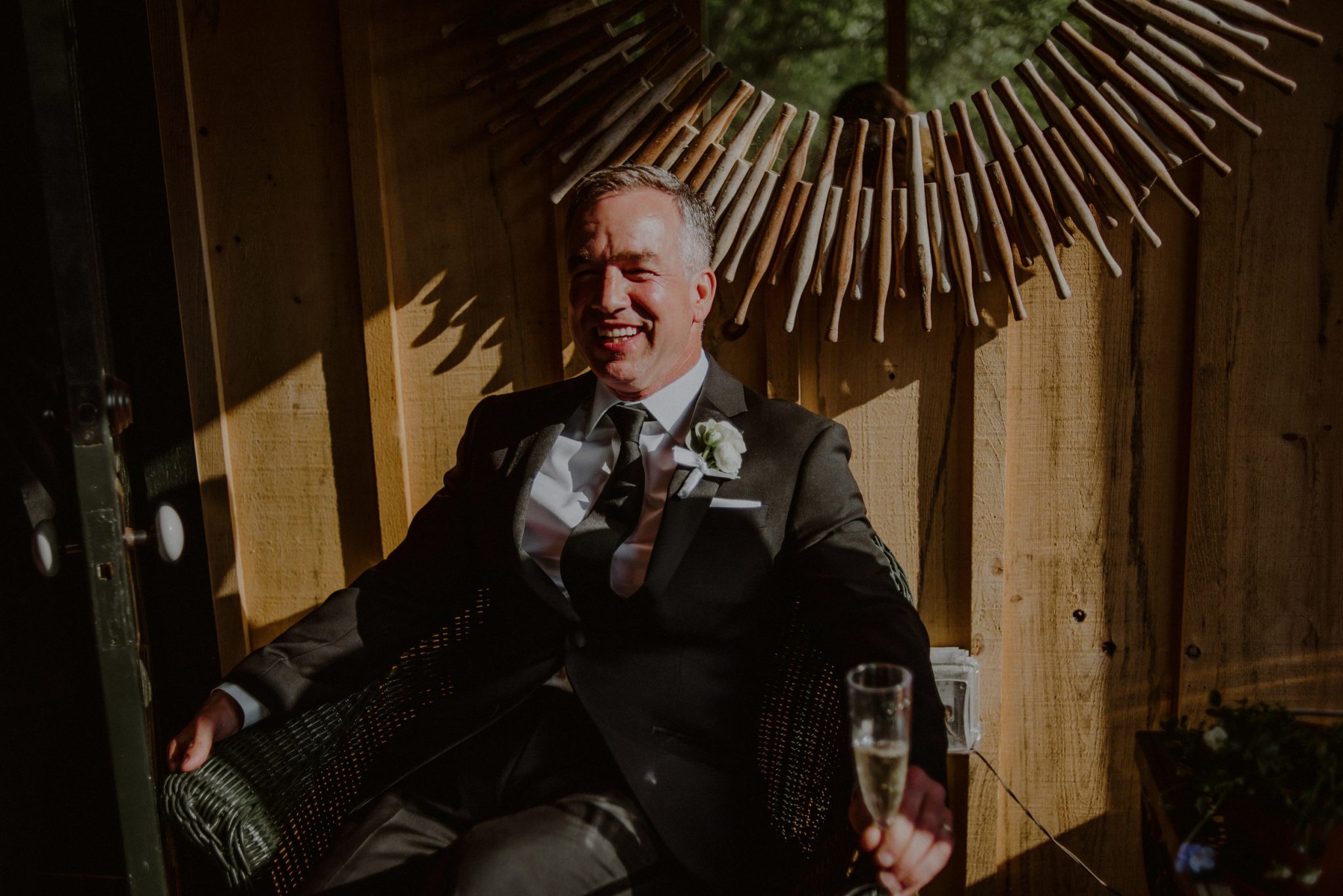 candid photo of relaxed groom