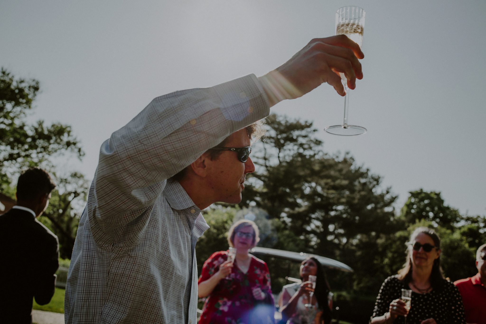 champagne toast at backyard wedding