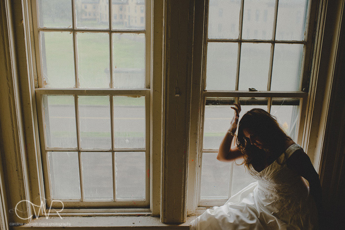 NJ Trash the dress session: bride in abandoned house by window