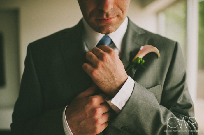 Lake House Inn Perkasie PA Wedding: groom fixing tie