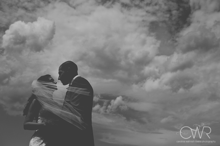 Lake House Inn Perkasie PA Wedding: bride and groom black and white against dark clouds