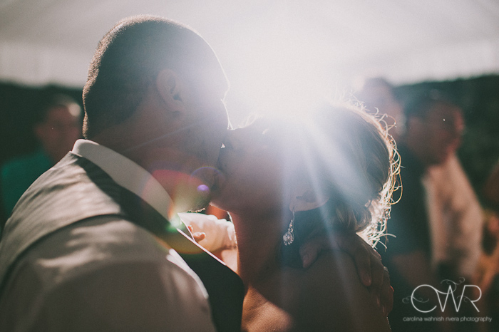 Olde Mill Inn Basking Ridge NJ Wedding: bride and groom kissing with light