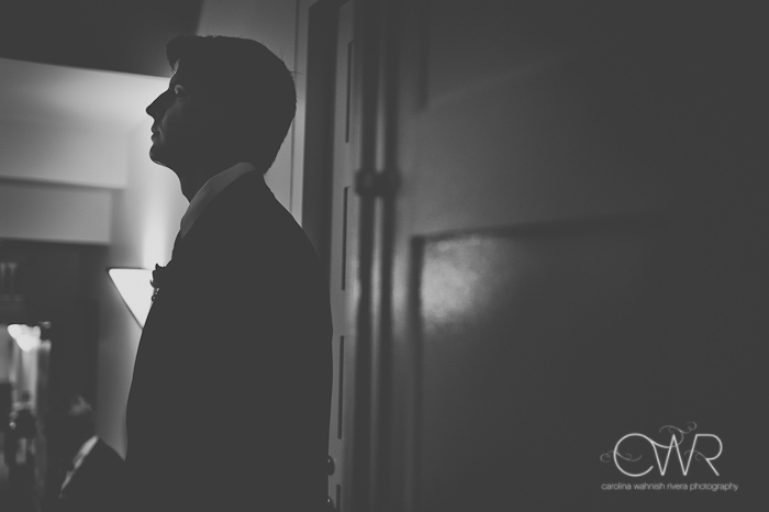 Harold Pratt House NYC Wedding: groom anxiously waiting in corridor