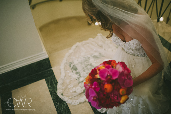 Harold Pratt House NYC Wedding: bride fixing dress