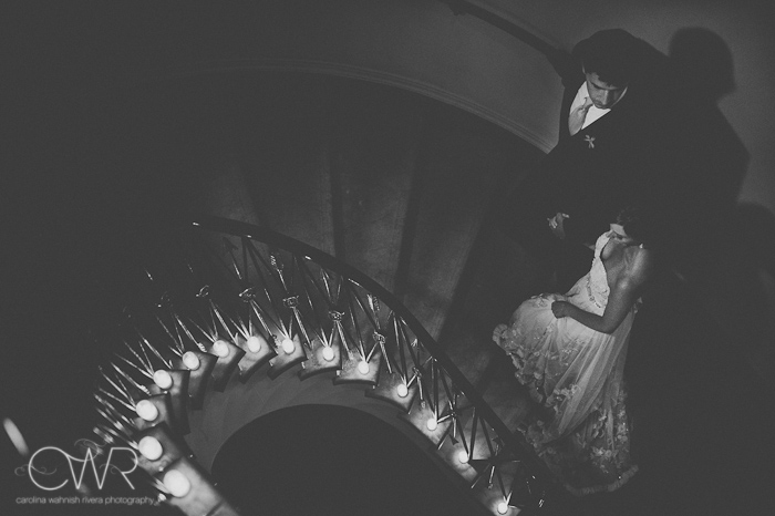 Harold Pratt House NYC Wedding: bride and groom black and white staircase portrait