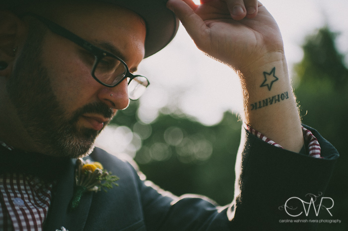 laurita winery wedding: groom with tattoo on wrist