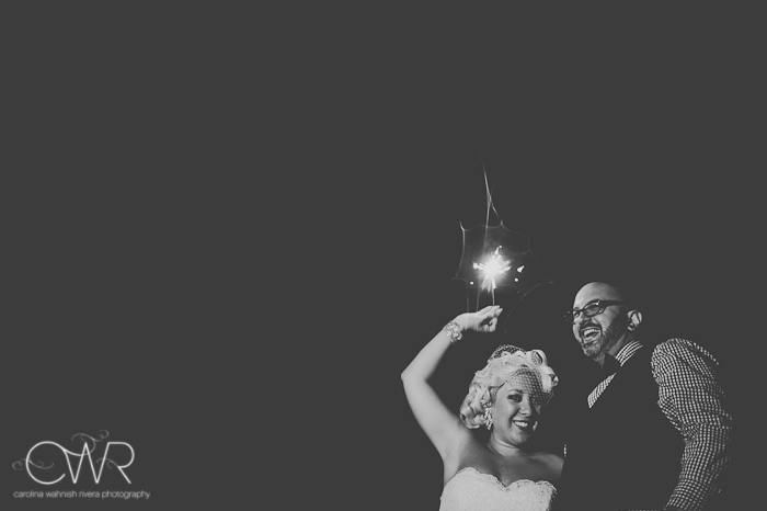 laurita winery wedding: sparklers outside with bride and groom