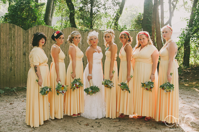 laurita winery wedding: bridesmaids in yellow flowing dresses