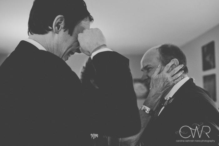 artistic wedding photos in black and white of emotional moment between groom and father