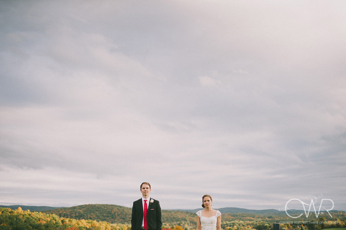 new york wedding photos in upstate ny farm, bride and groom against sky