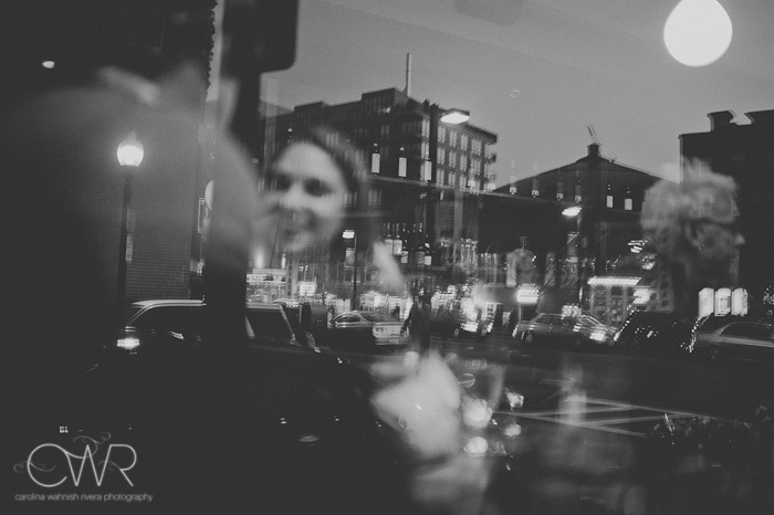 boston wedding photo of couple through reflection in window in black and white