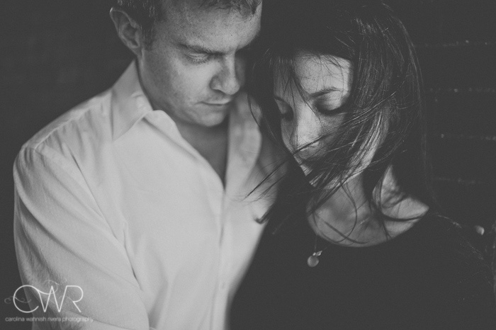 sexy engagement photos in black and white of couple embracing