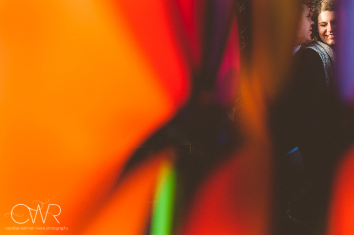 Chester NJ Wedding Photographer - fun colorful engagement photo of couple whispering 