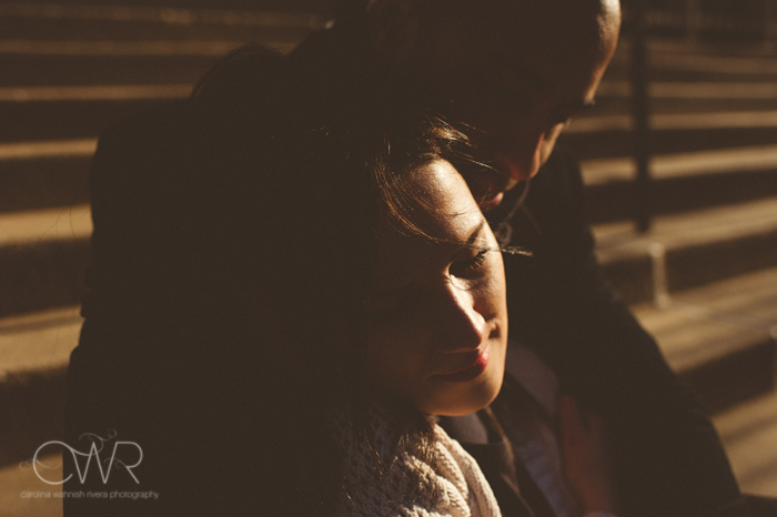 nyc interracial wedding photography - engagement photo of couple in dramatic lighting in soho nyc 