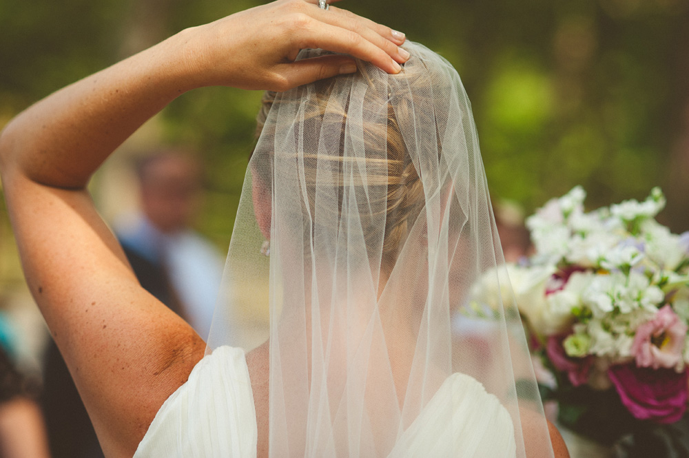 romantic weddings in ny set in the fall, bride holding onto veil