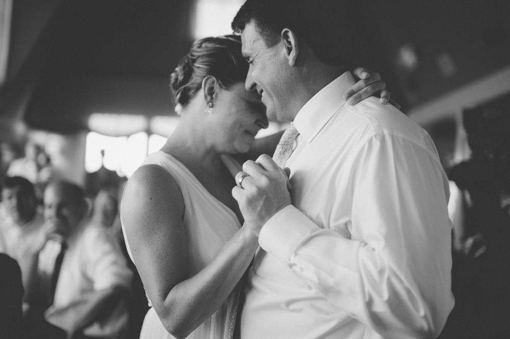 creative wedding photo in black and white of emotional moment between couple during first dance