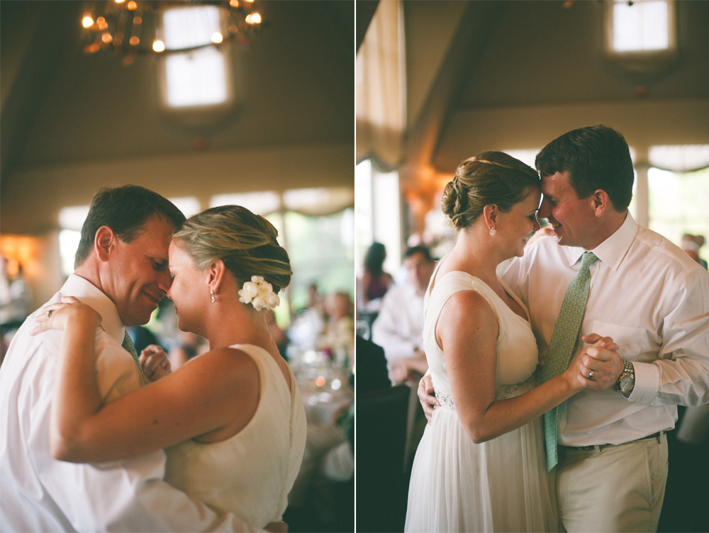 creative wedding photo of couple during first dance smiling 
