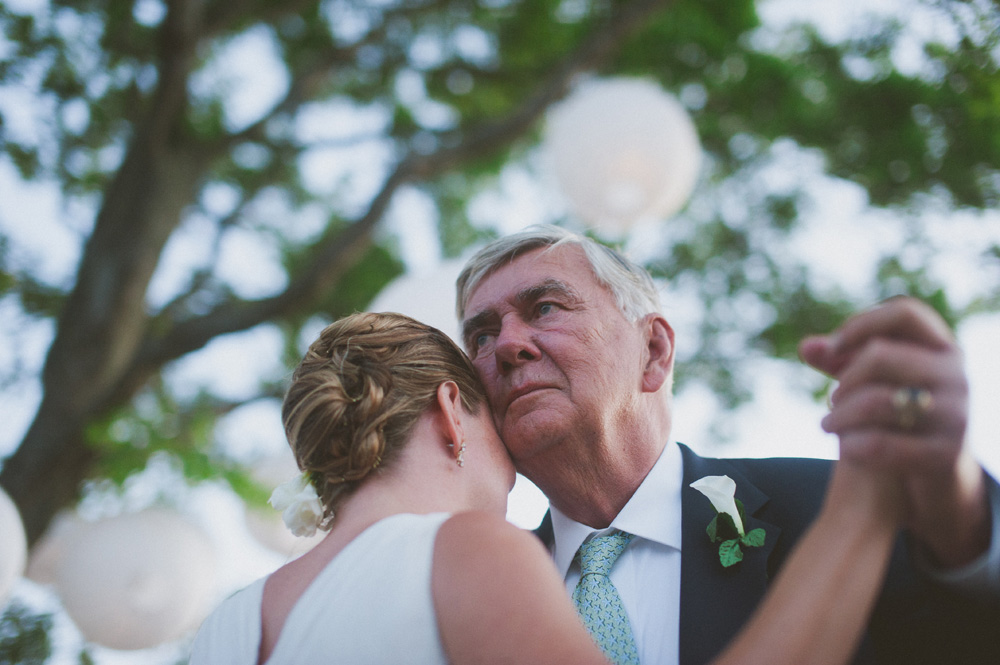 candid wedding photography emotional moment between bride and father