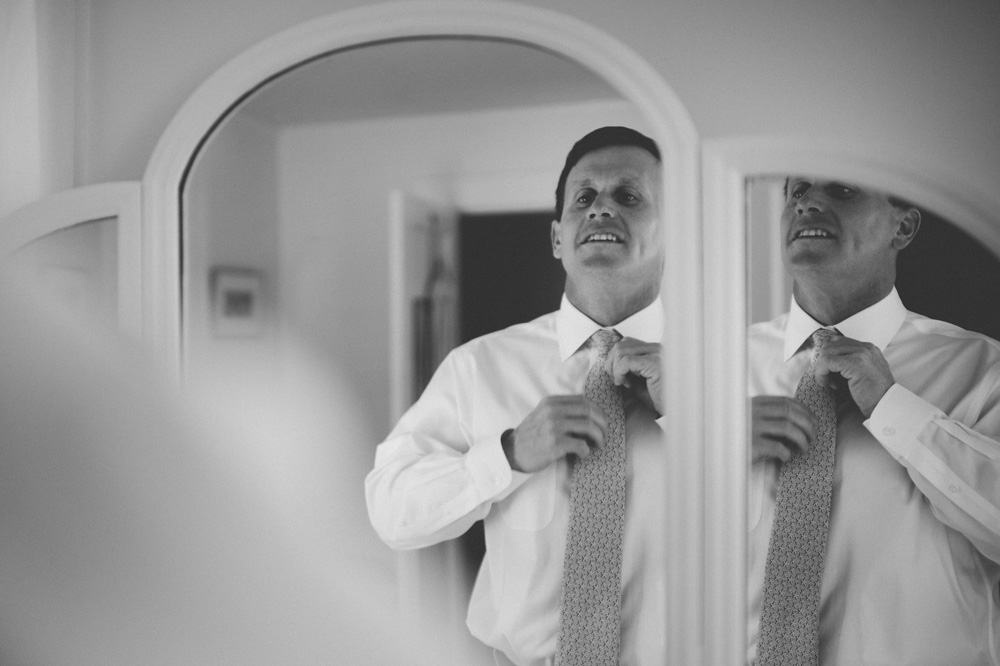NY Wedding groom gets ready at quaint bed and breakfast on Shelter Island